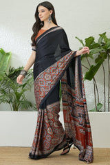 Invaluable Black Ajrakh Printed Semi Modal Silk Saree With Jazzy Blouse Piece
