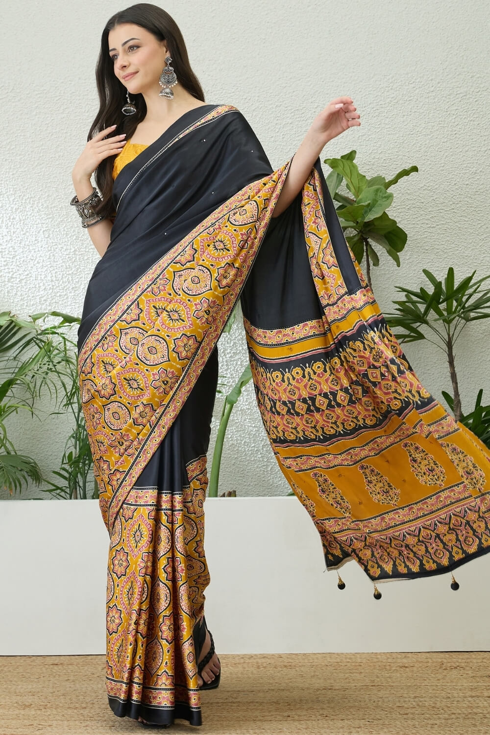 Jubilant Black Ajrakh Printed Semi Modal Silk Saree With Surpassing Blouse Piece