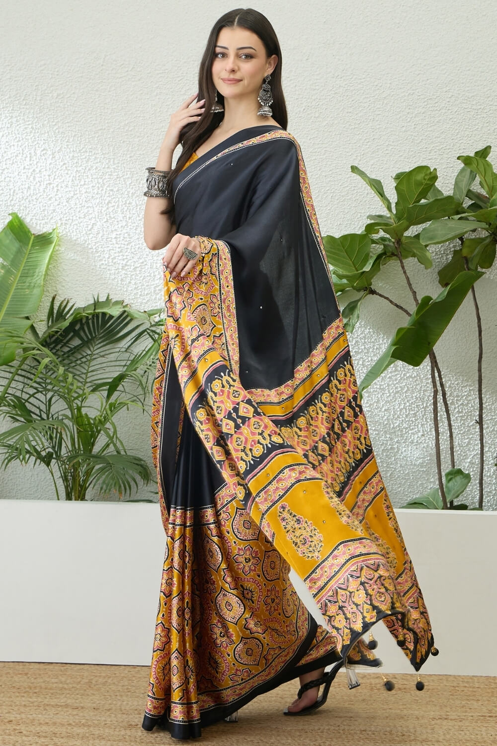 Jubilant Black Ajrakh Printed Semi Modal Silk Saree With Surpassing Blouse Piece