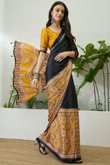 Jubilant Black Ajrakh Printed Semi Modal Silk Saree With Surpassing Blouse Piece