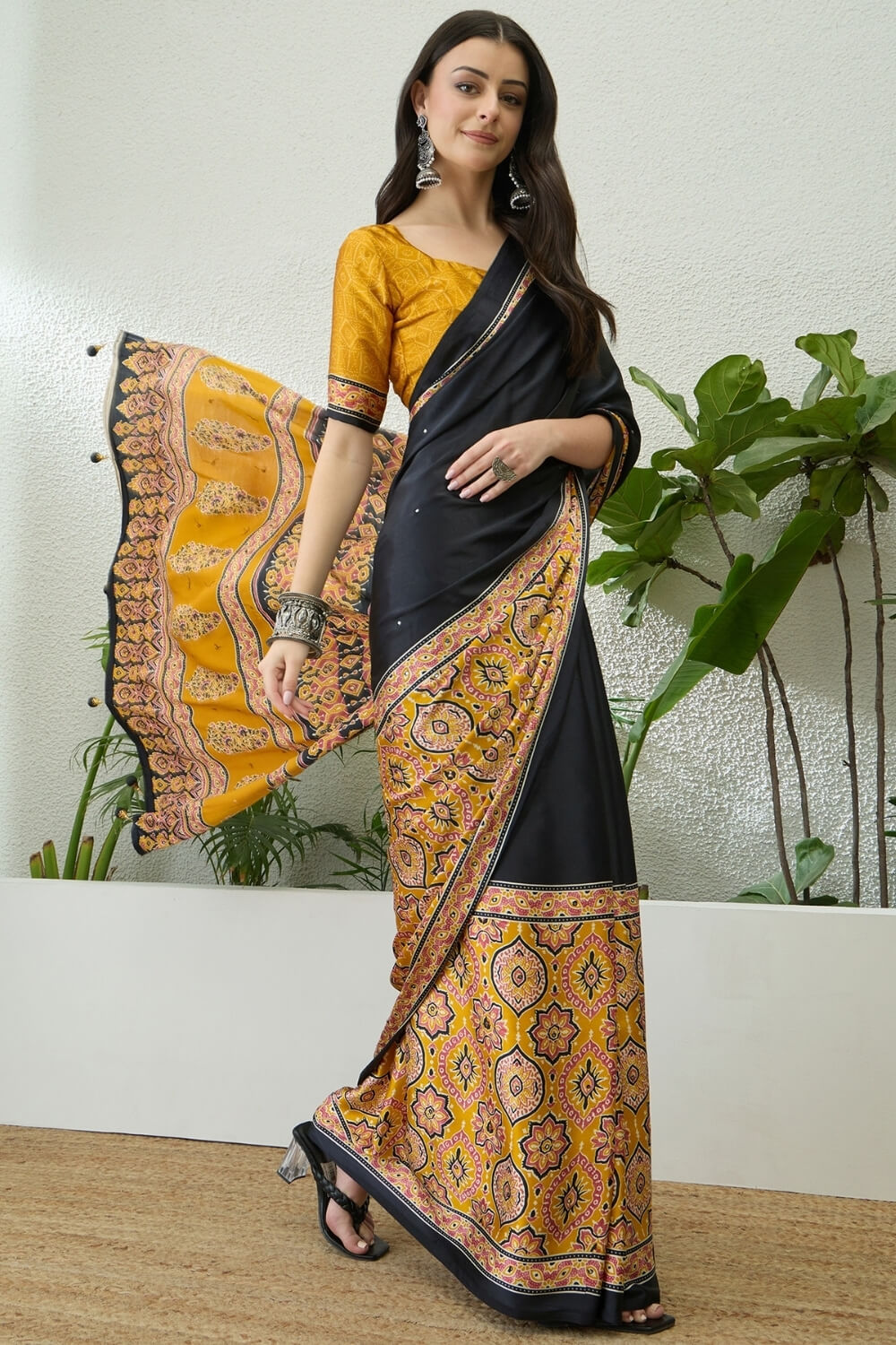 Jubilant Black Ajrakh Printed Semi Modal Silk Saree With Surpassing Blouse Piece