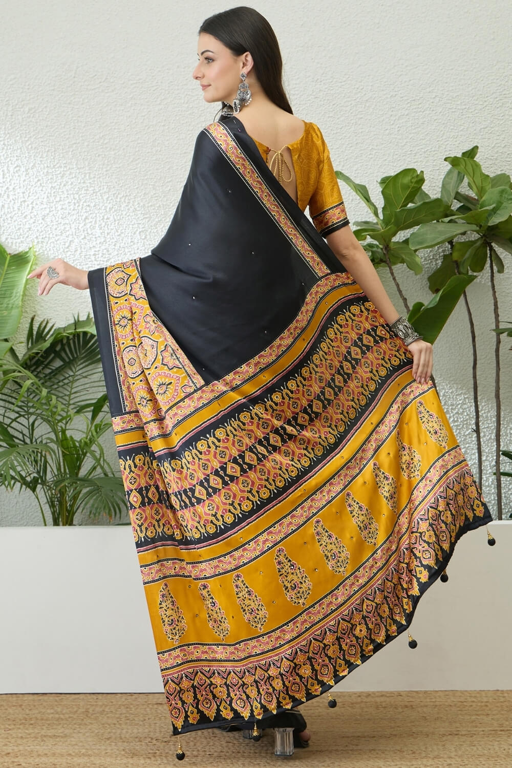 Jubilant Black Ajrakh Printed Semi Modal Silk Saree With Surpassing Blouse Piece