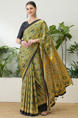 Mesmeric Yellow Ajrakh Printed Semi Modal Silk Saree With Rhapsody Blouse Piece