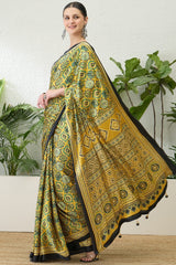 Mesmeric Yellow Ajrakh Printed Semi Modal Silk Saree With Rhapsody Blouse Piece
