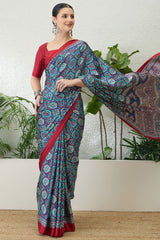 Dazzling Navy Blue Ajrakh Printed Semi Modal Silk Saree With Fairytale Blouse Piece