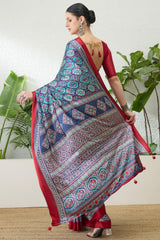 Dazzling Navy Blue Ajrakh Printed Semi Modal Silk Saree With Fairytale Blouse Piece