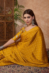 Adorning Mustard Ajrakh Printed Semi Modal Silk Saree With Tantalizing Blouse Piece