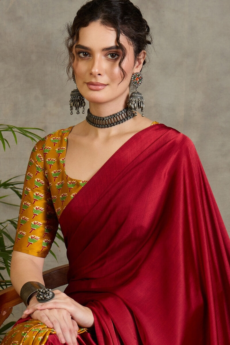 Confounding Red Ajrakh Printed Semi Modal Silk Saree With Brood Blouse Piece