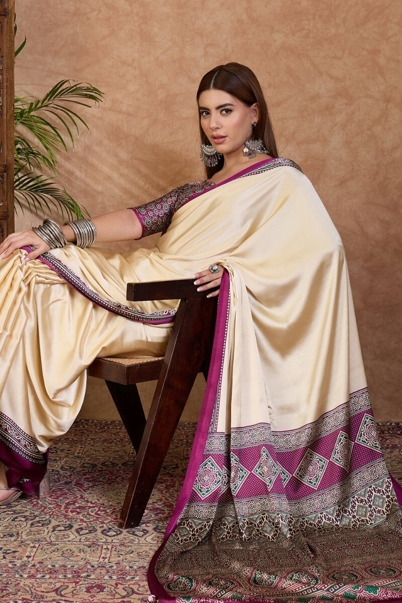 Twirling Off White Ajrakh Printed Semi Modal Silk Saree With Piquant Blouse Piece