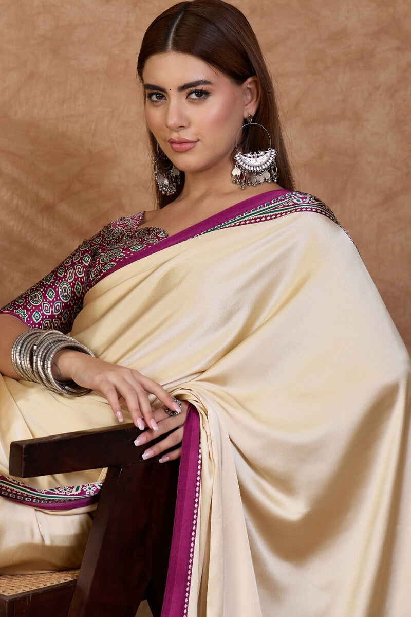 Twirling Off White Ajrakh Printed Semi Modal Silk Saree With Piquant Blouse Piece
