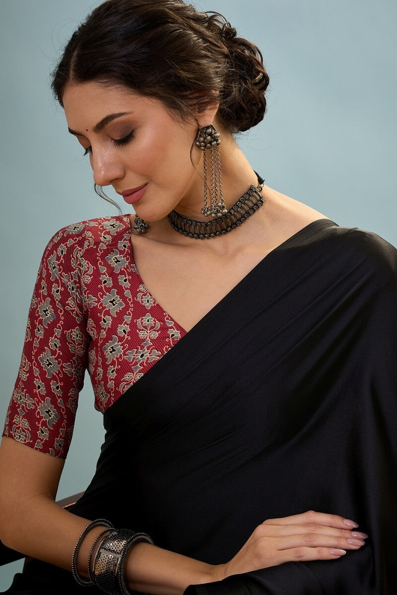 Innovative Black Ajrakh Printed Semi Modal Silk Saree With Snazzy Blouse Piece