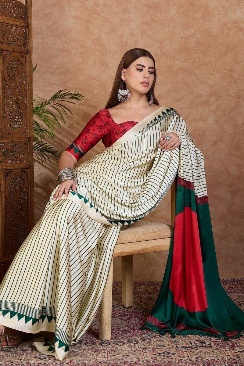 Glittering Off White Ajrakh Printed Semi Modal Silk Saree With Quixotic Blouse Piece