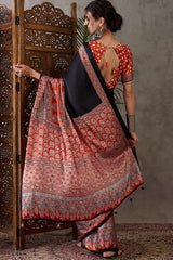 Enticing Black Ajrakh Printed Semi Modal Silk Saree With Winsome Blouse Piece