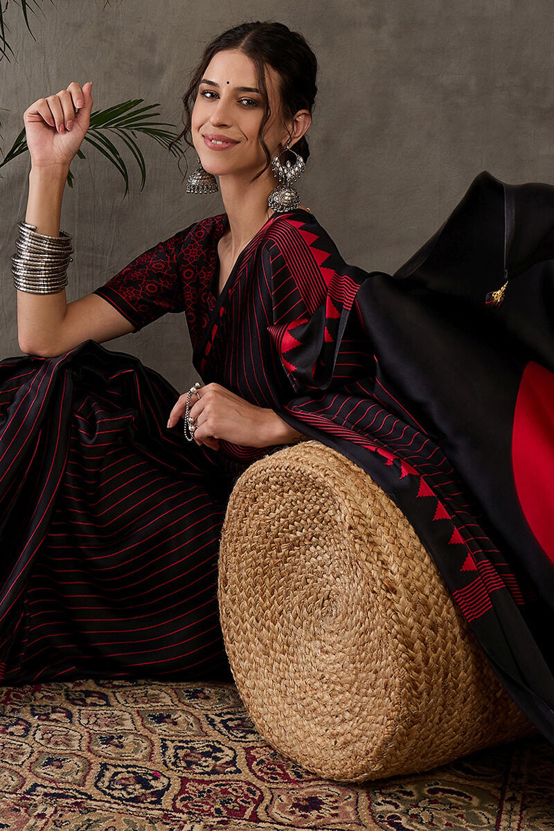 Diaphanous Black Ajrakh Printed Semi Modal Silk Saree With Majestic Blouse Piece