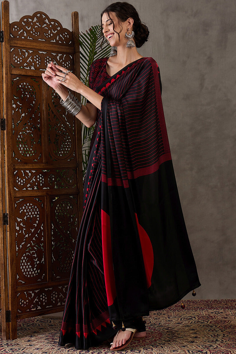 Diaphanous Black Ajrakh Printed Semi Modal Silk Saree With Majestic Blouse Piece