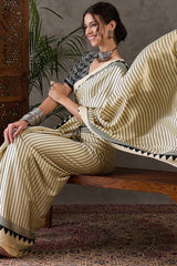 Alluring Beige Ajrakh Printed Semi Modal Silk Saree With Cynosure Blouse Piece