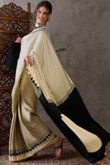 Alluring Beige Ajrakh Printed Semi Modal Silk Saree With Cynosure Blouse Piece