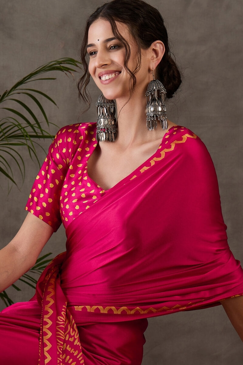 Appealing Dark Pink Ajrakh Printed Semi Modal Silk Saree With Elision Blouse Piece