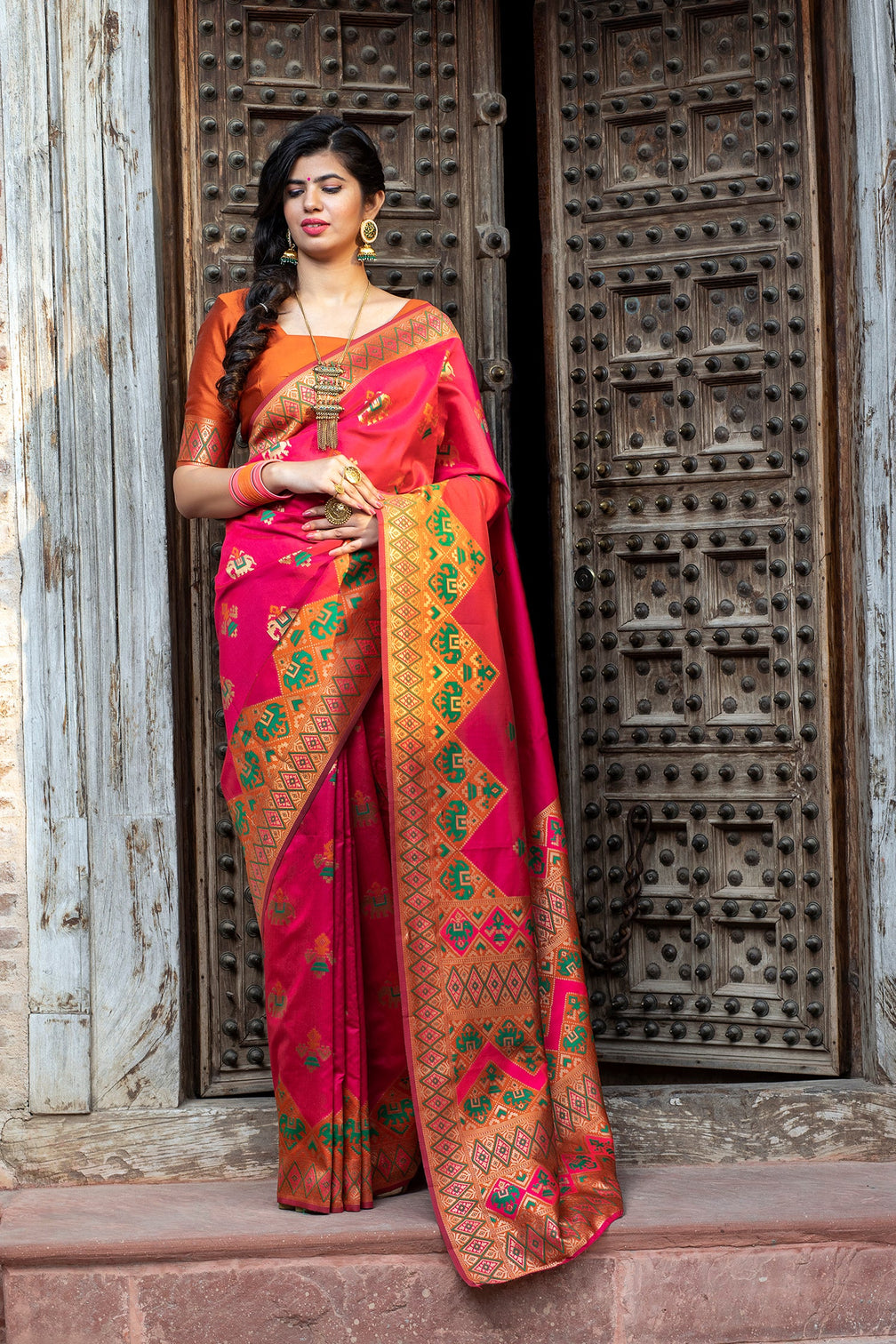 Glamourous Dark Pink Woven Silk Patola Fancy Saree