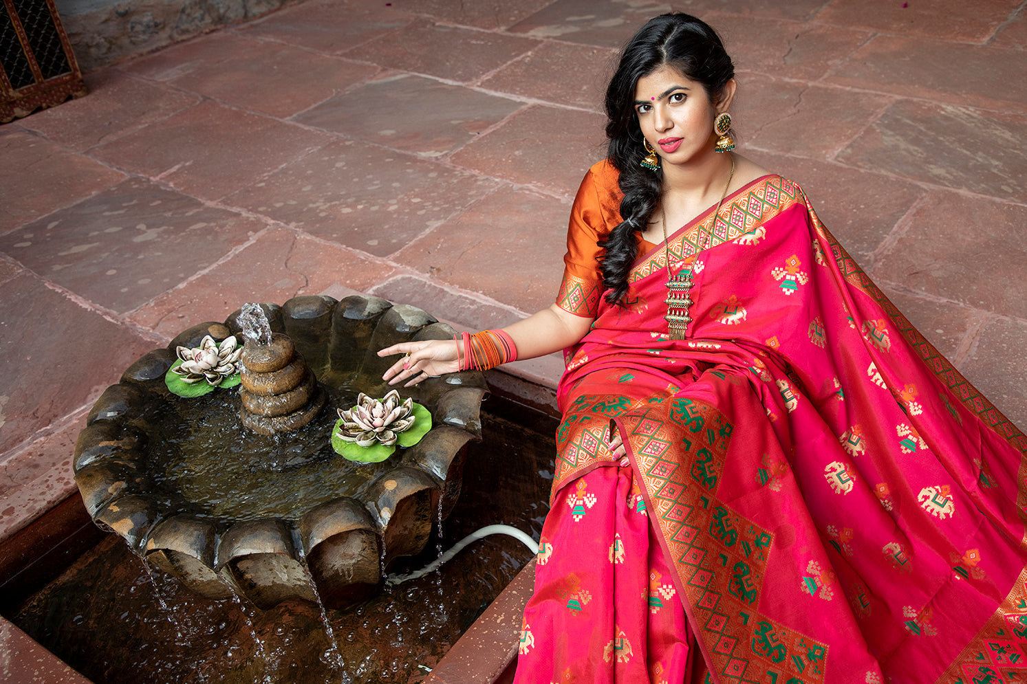 Glamourous Dark Pink Woven Silk Patola Fancy Saree