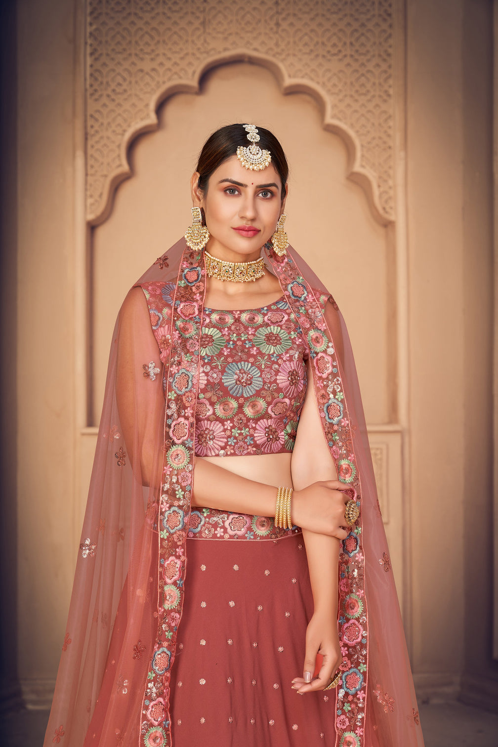 Gorgeous Orange Thread And Sequins Embroidered Georgette Semi Stitched Party Wear Lehenga