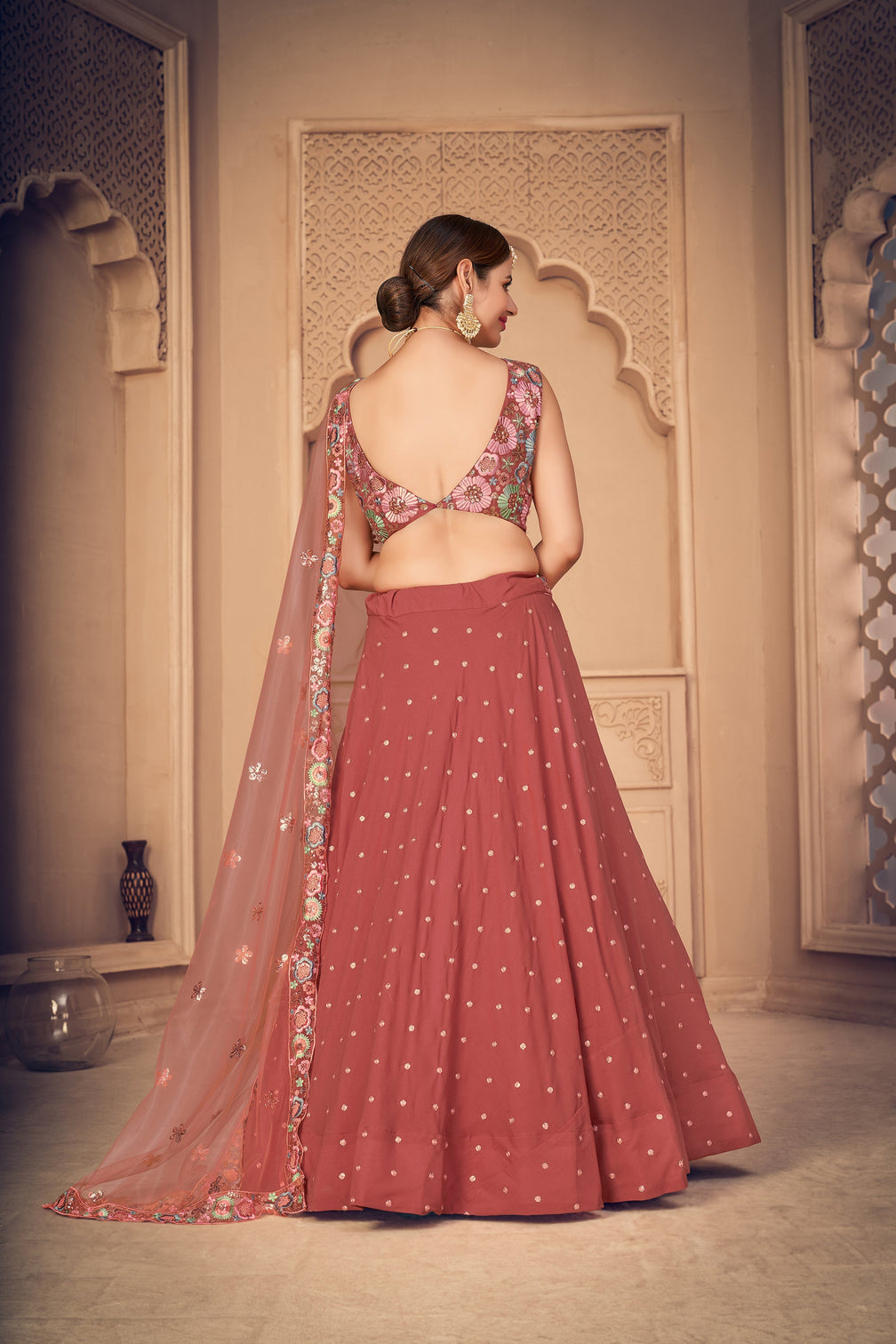 Gorgeous Orange Thread And Sequins Embroidered Georgette Semi Stitched Party Wear Lehenga