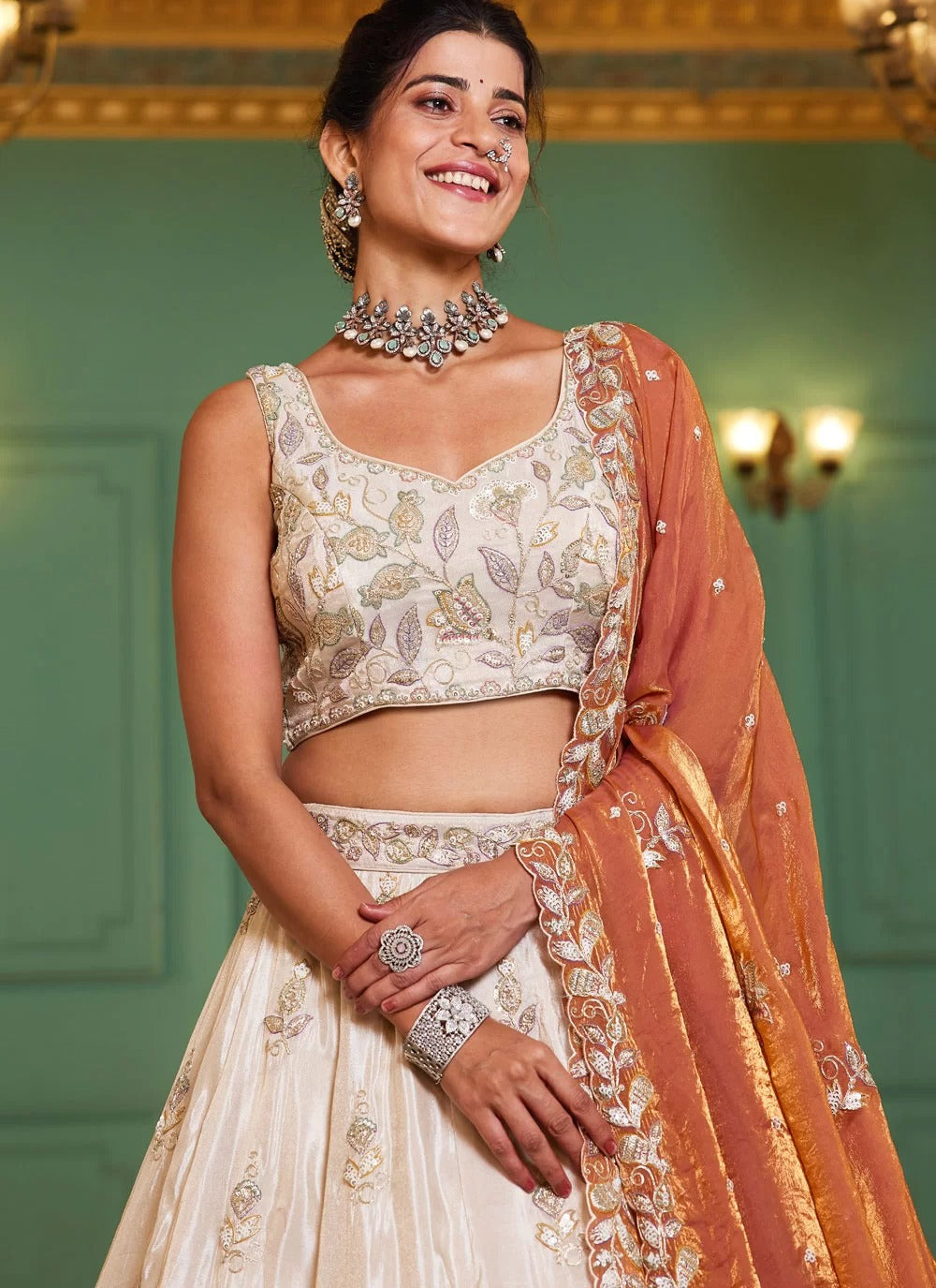 Gorgeous orange tissue embroidered sangeet wear lehenga choli with designer dupatta