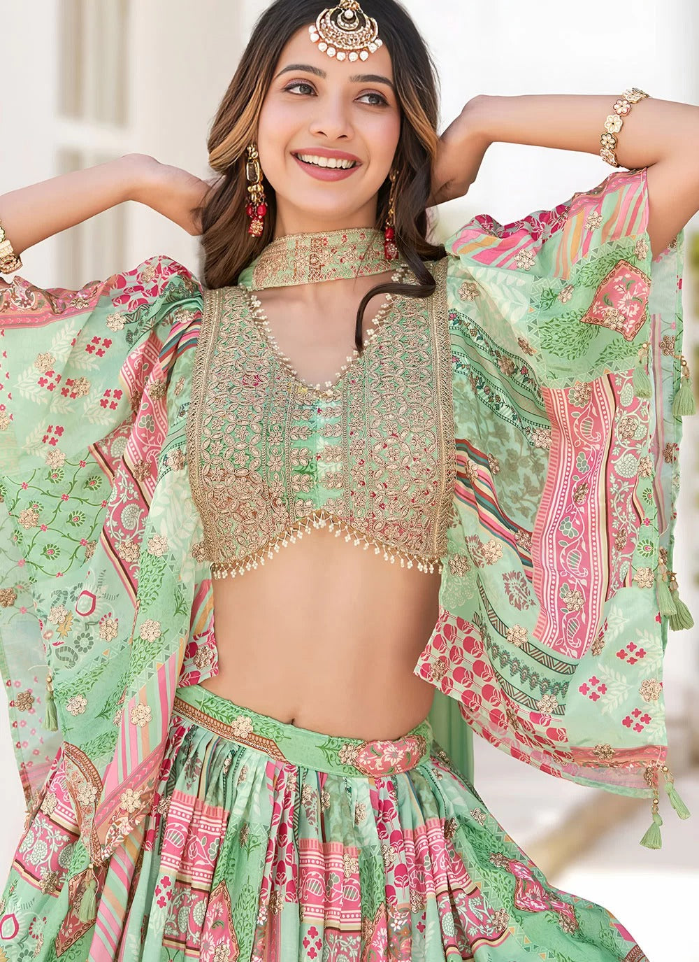 Graceful green dori embroidered chinnon silk sangeet special lehenga choli with dupatta