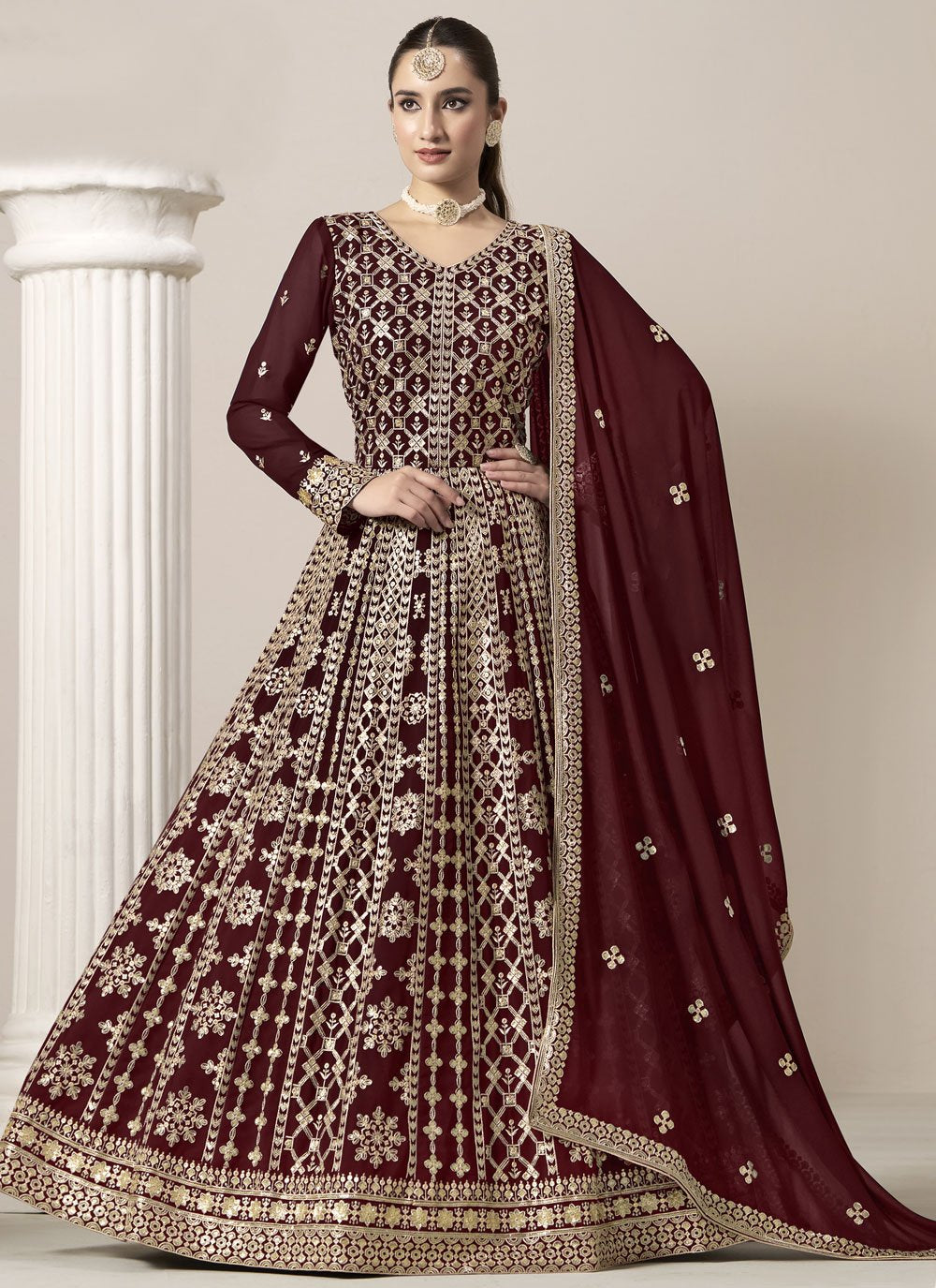 Graceful maroon faux georgette embroidered abaya style suit