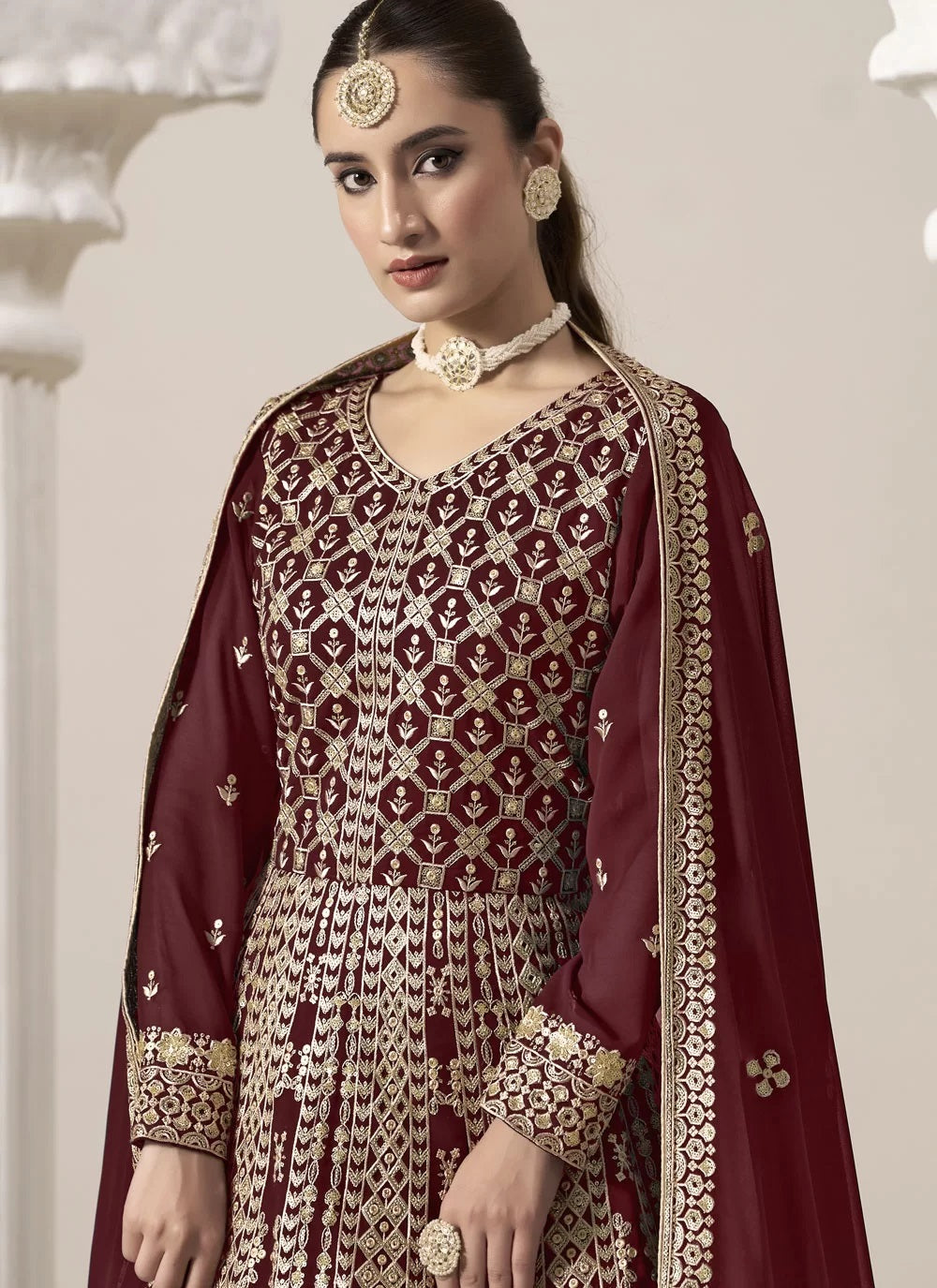 Graceful maroon faux georgette embroidered abaya style suit
