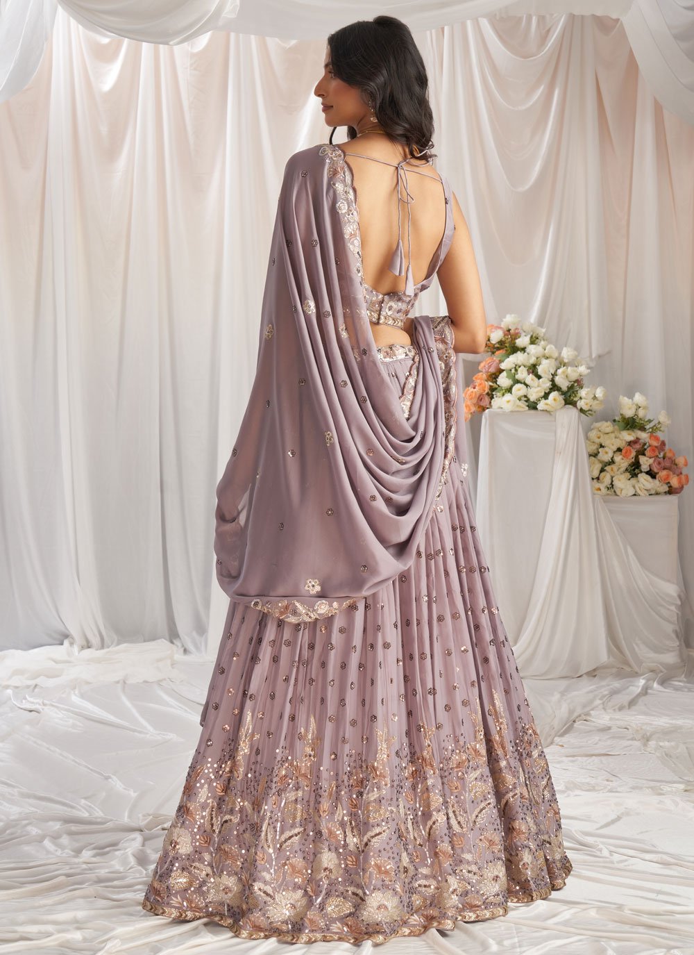Graceful mauve embroidered wedding lehenga in poly georgette with sequins thread work