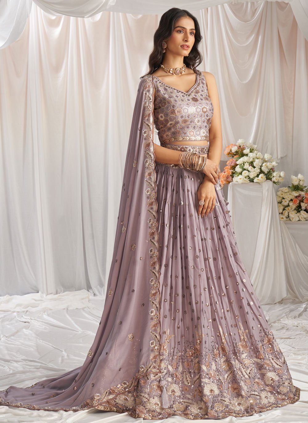 Graceful mauve embroidered wedding lehenga in poly georgette with sequins thread work