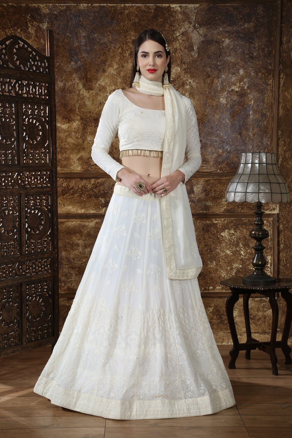 Graceful Off White Georgette Thread and Sequence Embroidered Lehenga Choli