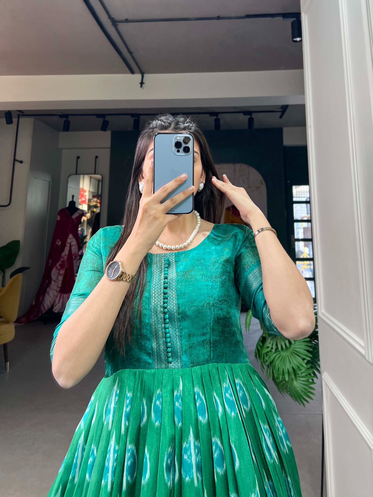 Green Color Dola Silk Printed Gown with Exquisite Zari Border