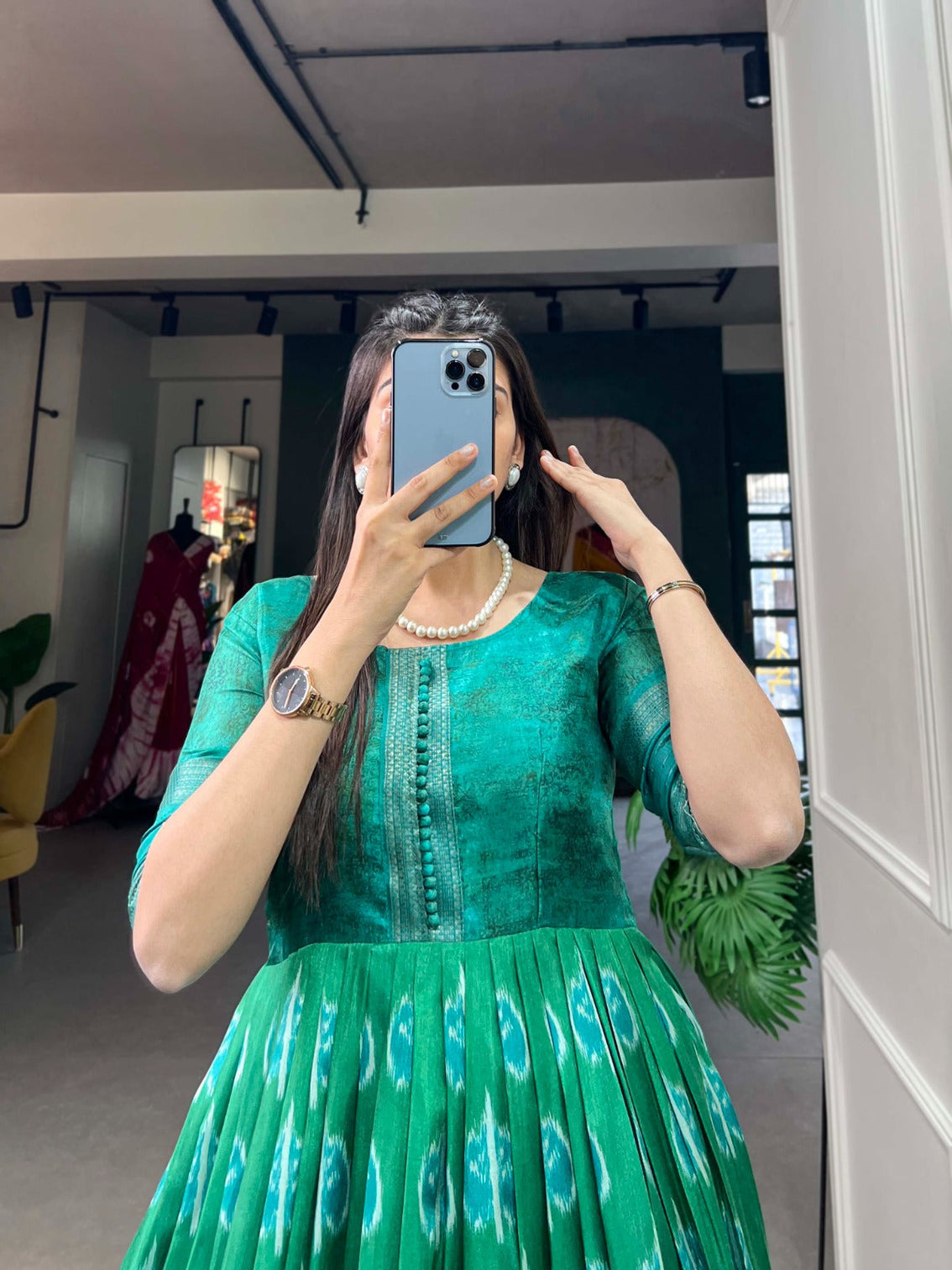 Green Color Dola Silk Printed Gown with Exquisite Zari Border