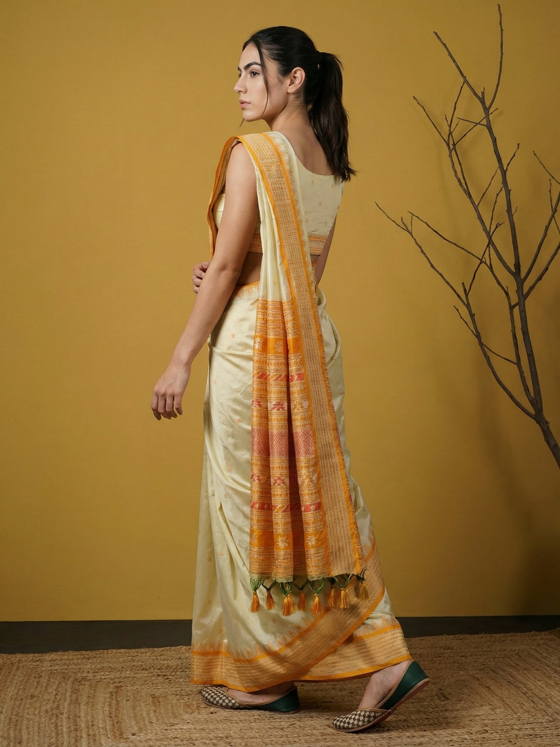 Yellow handloom soft silk saree with zari woven motifs