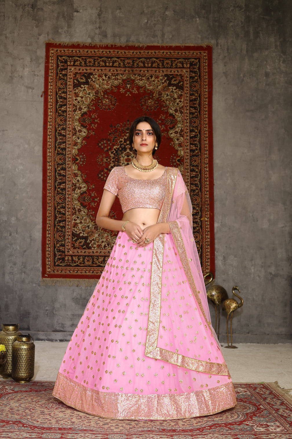 Hypnotizing Pink Sequins Embroidered Net Semi Stitched Lehenga Choli