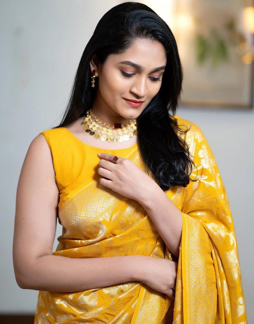 Yellow Soft Lichi Silk Saree With Zari Weaving Work