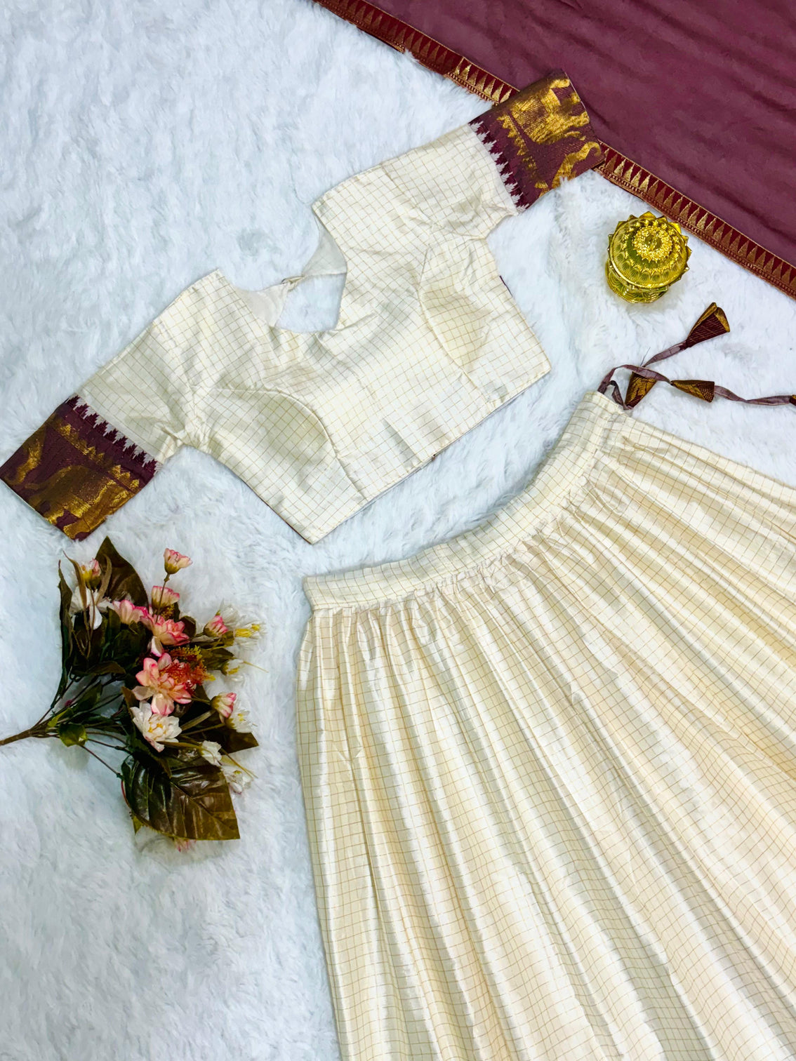Elegant elephant white checks silk lehenga light shades to complement to create beautiful aura in all function