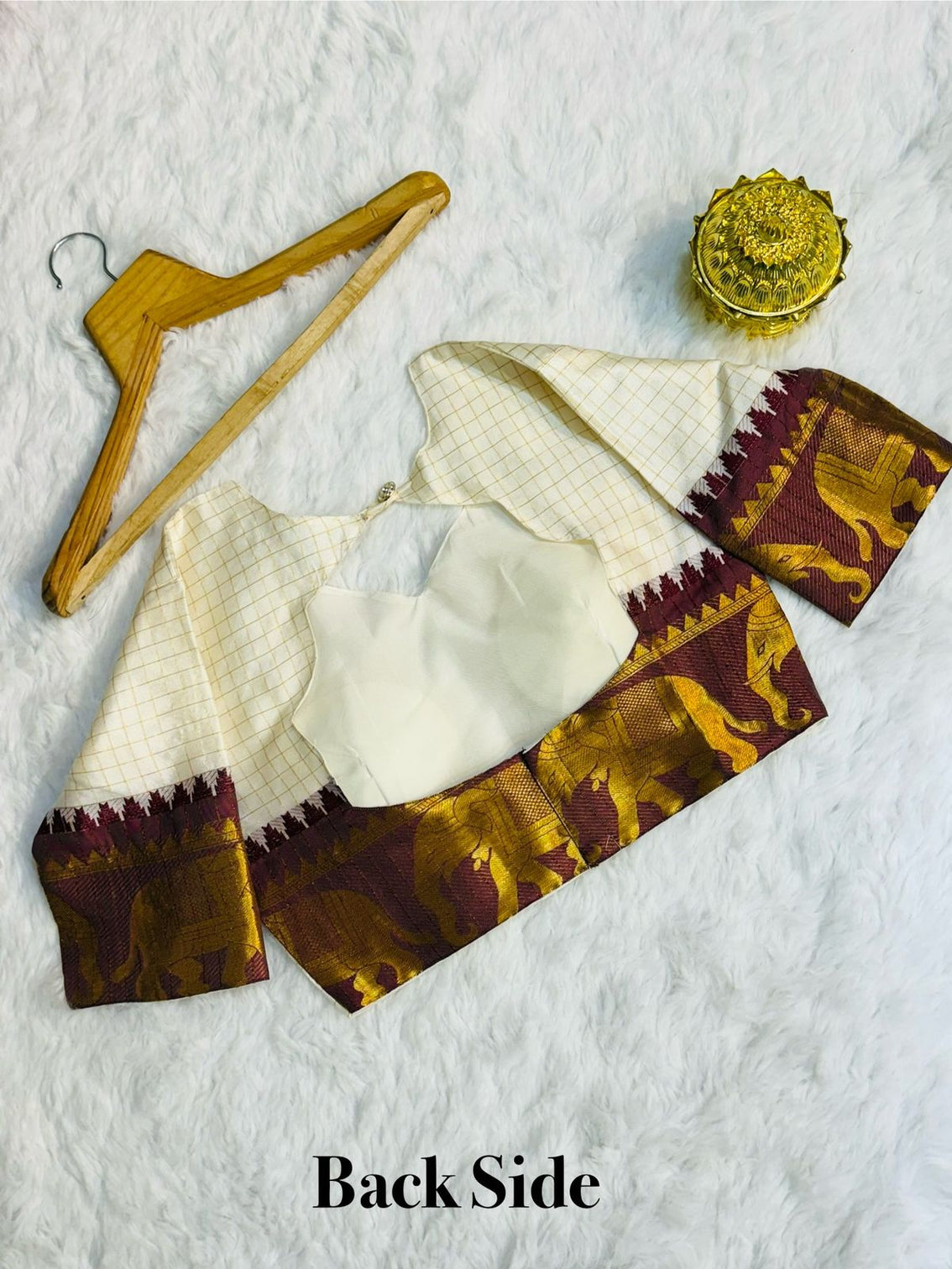 Elegant elephant white checks silk lehenga light shades to complement to create beautiful aura in all function