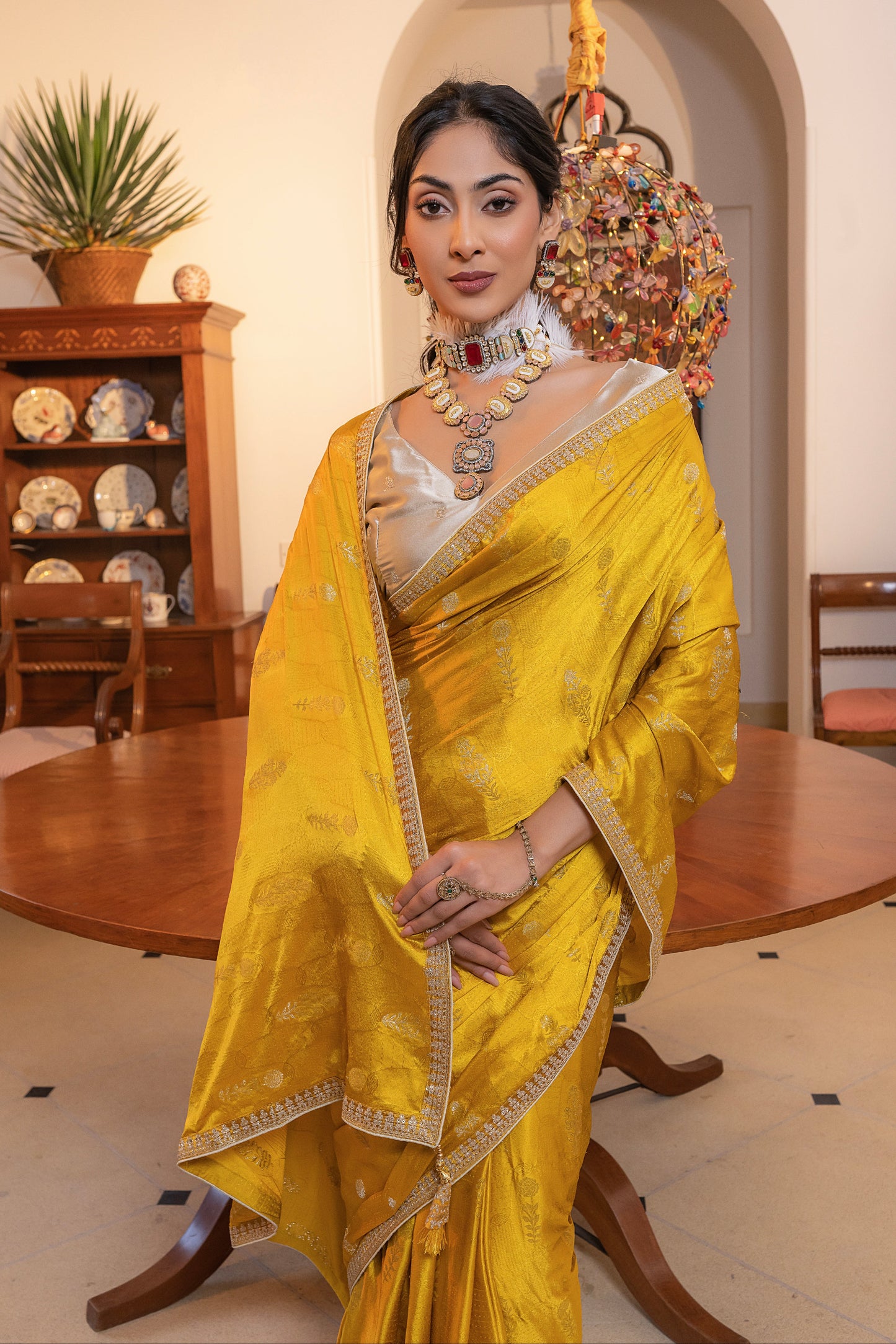 Yellow Viscose Satin Silk Saree with Zari Motifs and Sequin Embroidery