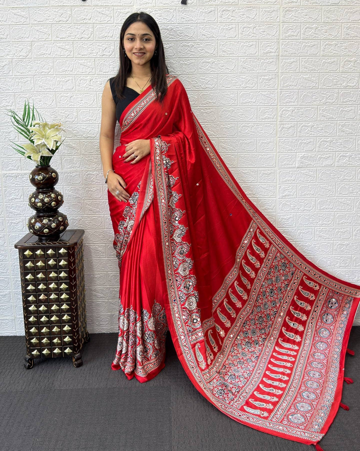 Ruby red modal silk saree with heritage paisley pallu intricate floral border traditional ethnic prints mameraa
