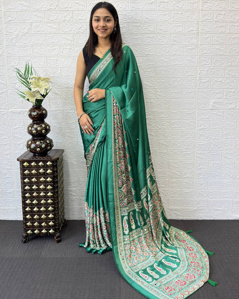 Emerald green modal silk saree with traditional paisley pallu floral border elegant ethnic prints