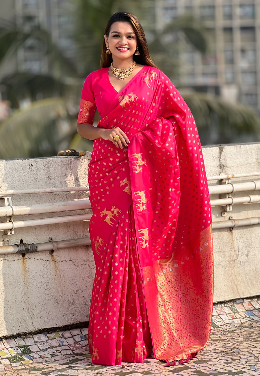 Pink soft silk dual zari woven saree with deer border