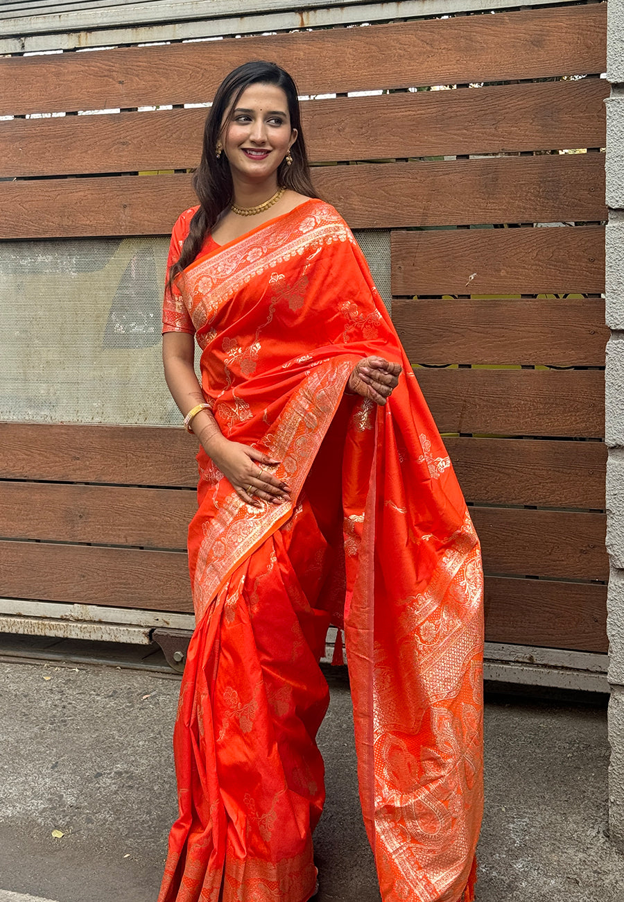 Orange banarasi jaal soft silk zari woven saree