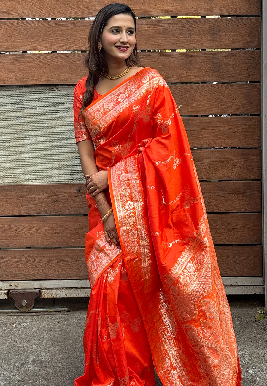 Orange banarasi jaal soft silk zari woven saree