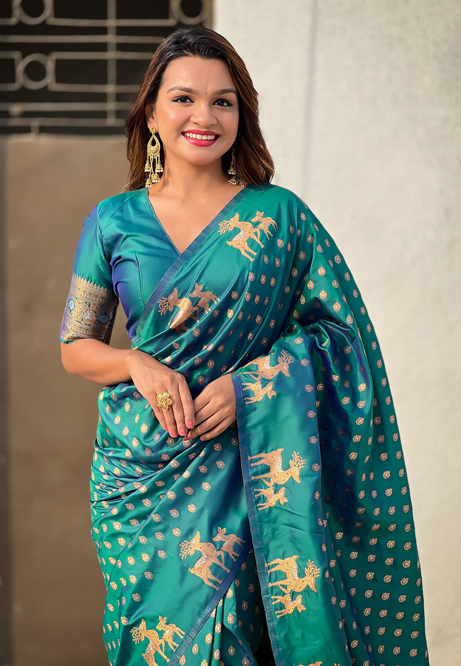 Green soft silk dual zari woven saree with deer border