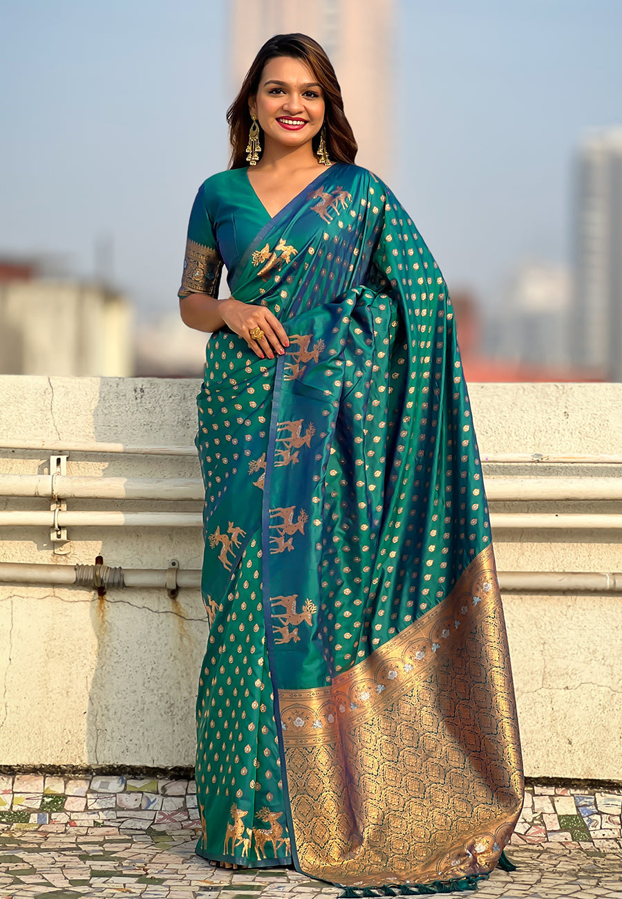 Green soft silk dual zari woven saree with deer border