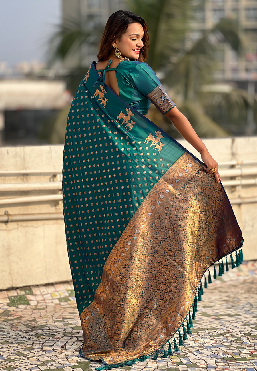 Green soft silk dual zari woven saree with deer border
