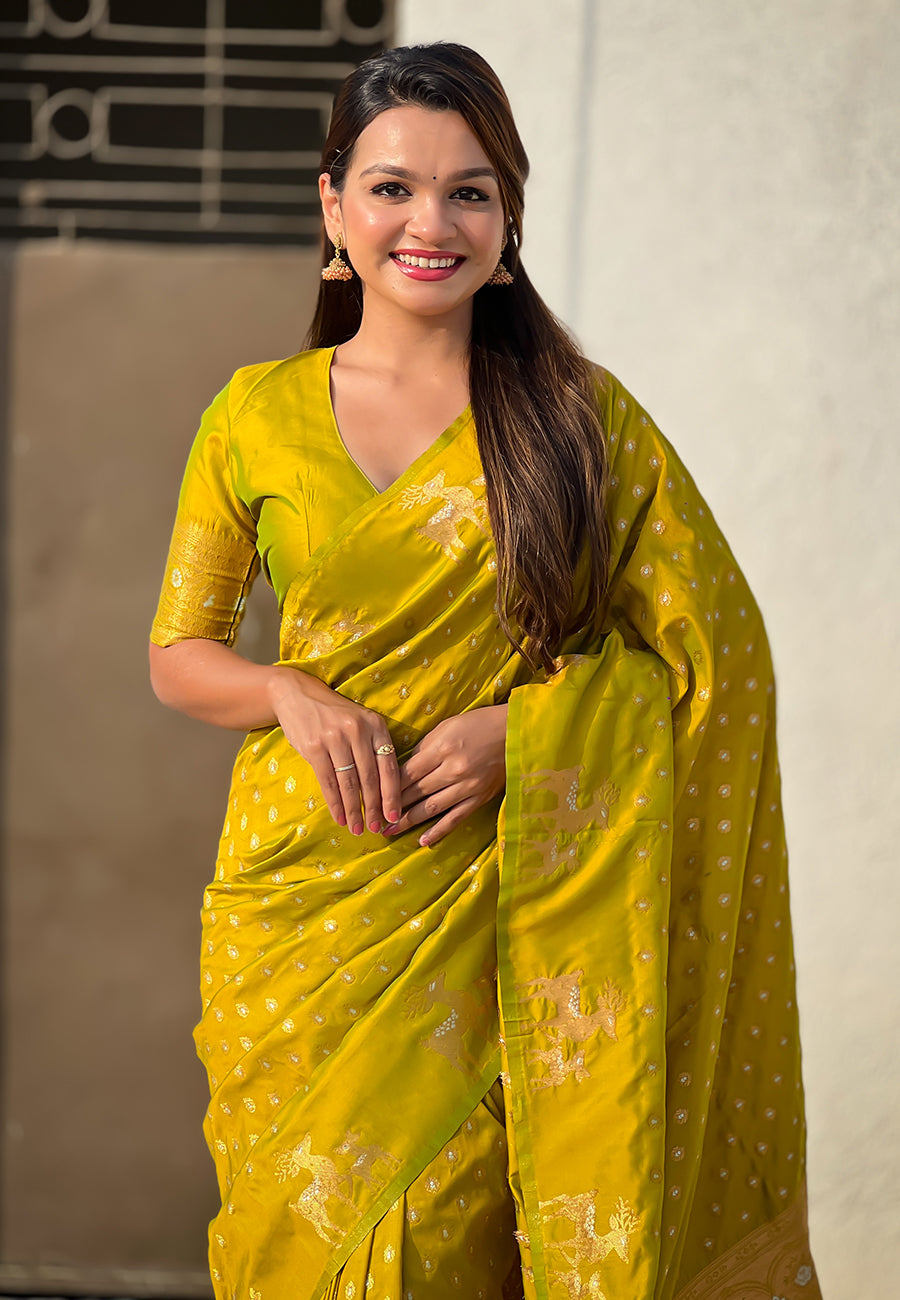 Mehendi green soft silk dual zari woven saree with deer border